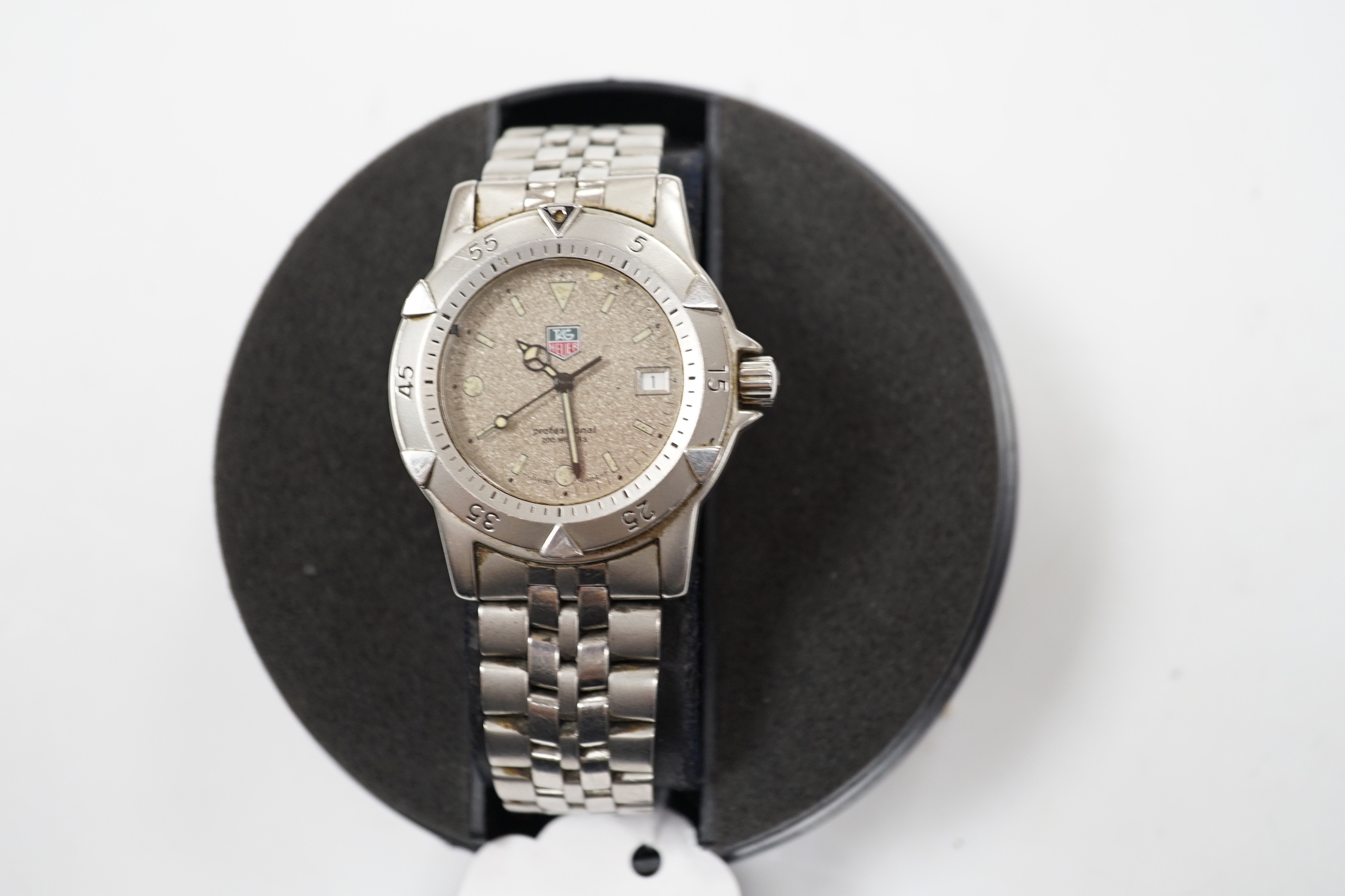 A gentleman's stainless steel Tag Heuer Professional quartz wrist watch, WD 1211-K-20, with box, instructions and guarantee.